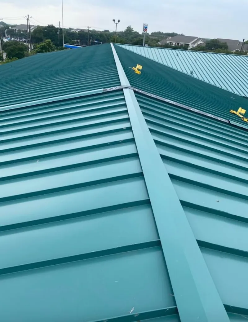 Green commercial metal roof ridge and valley for Metal Roof Repair in Green Bay